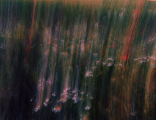 Abstract vertical streaks of green and red colors.